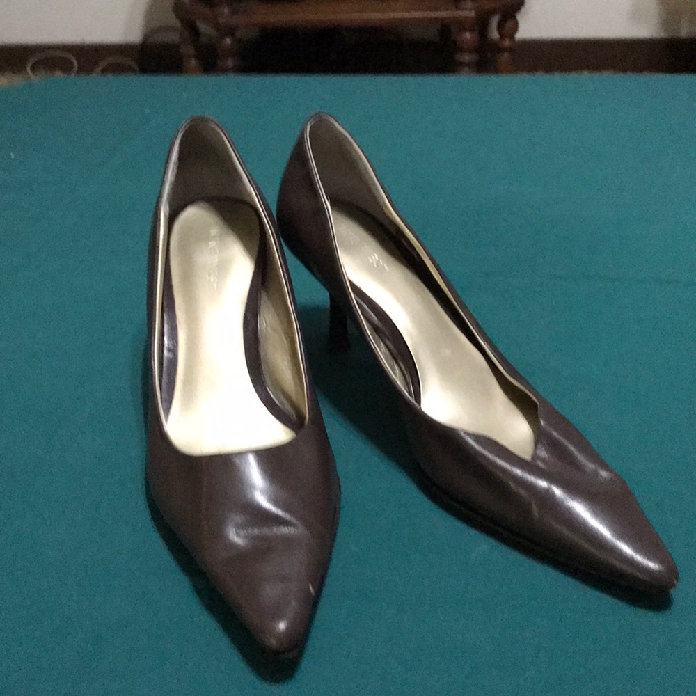 Brown leather pumps